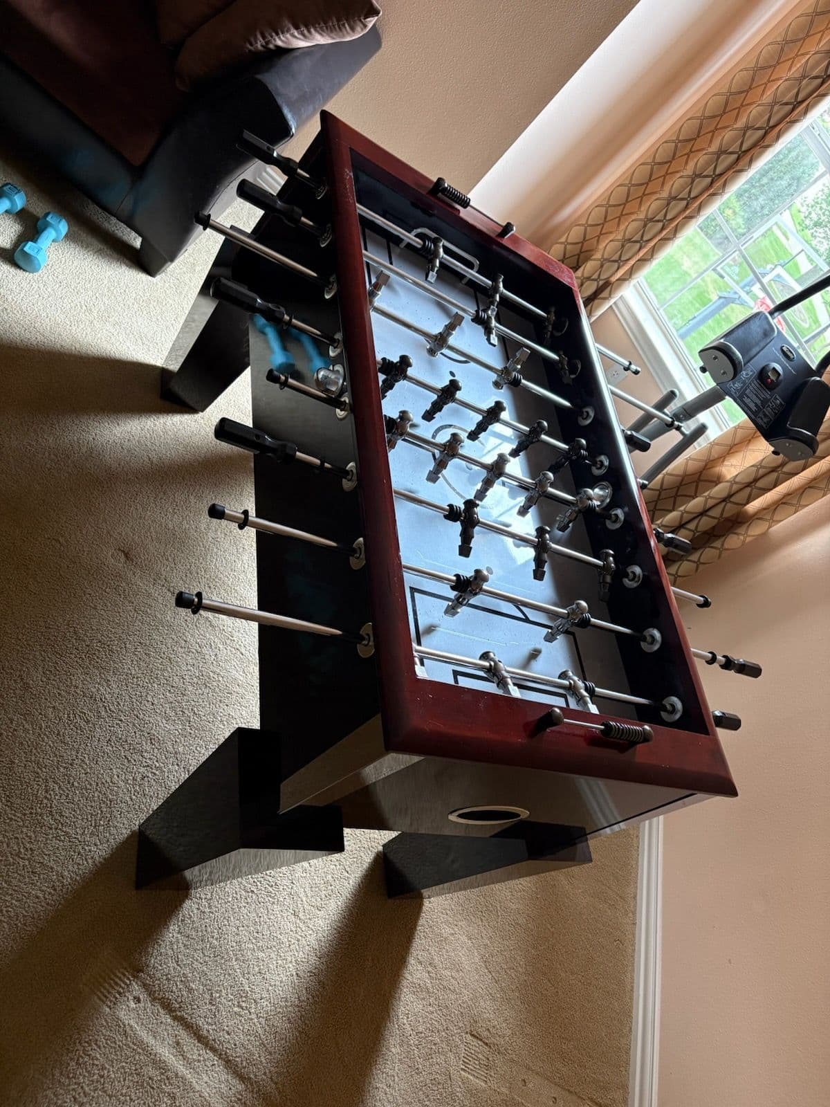 Foosball Table Removal Simplifies Cleanup in Murphy image